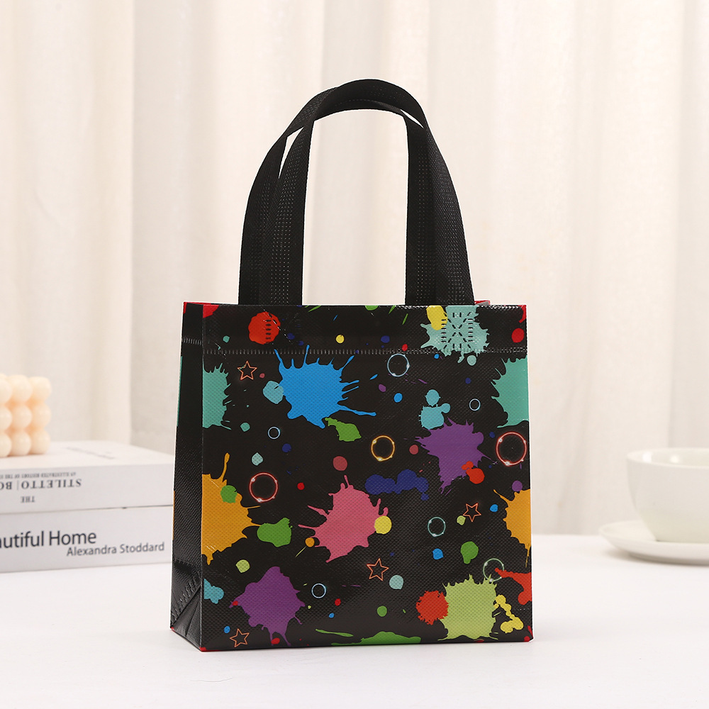 ギフト包装袋 不織布 蛍光落書き風船 キャンディギフトバッグ - Party Event Supply Store のレビューと価格